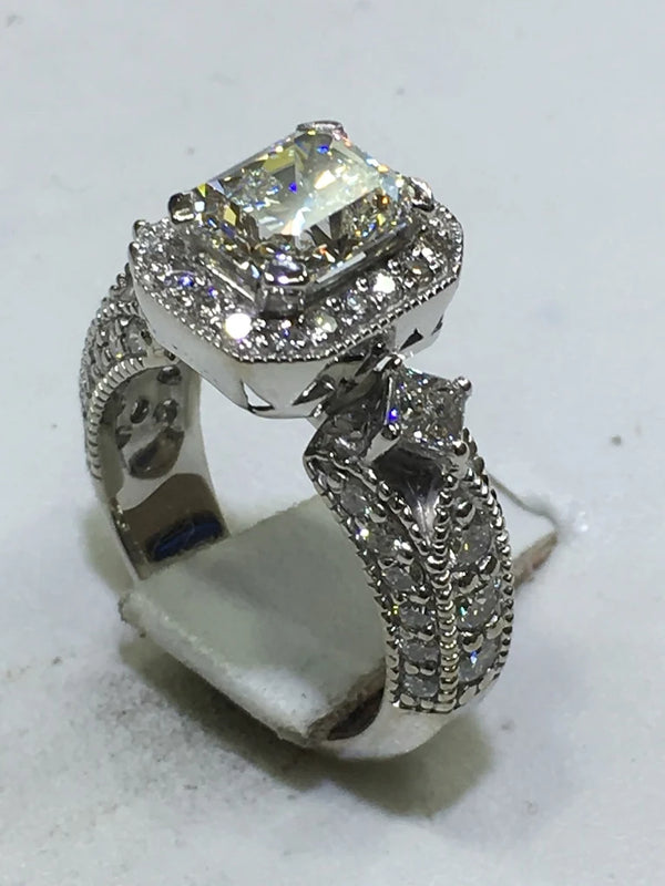 Vintage Radiant‑Cut Halo Engagement Ring with Milgrain Detail